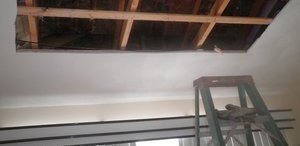 Water Damage Ceiling Restoration In Progress